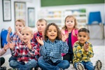 young children clapping excitedly
