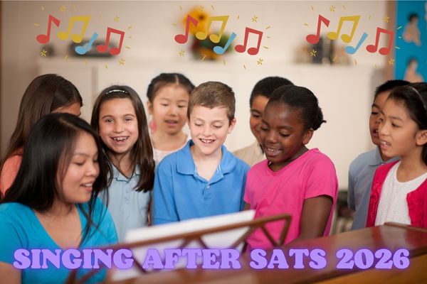 children singing around a piano smiling