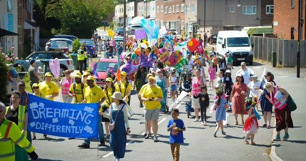 people taking part on a carnival parade